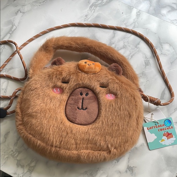 miniso Handbags - Miniso Capybara fuzzy crossbody purse